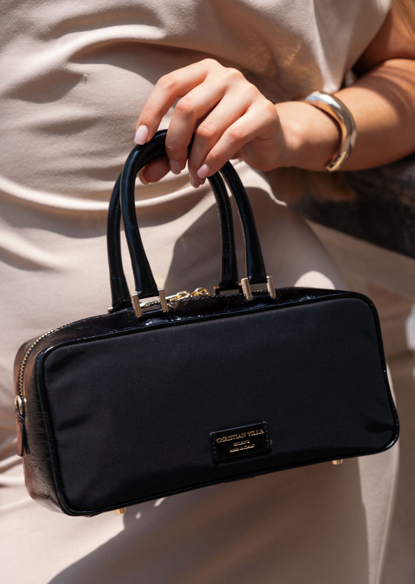 Hanna Small Black – A compact nylon and leather bag with essential style